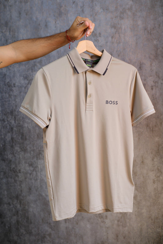 Polo HUG Beige Detalles Negras Tela Deportiva